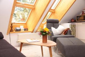 Posezení v ubytování Gästehaus Peerhus Dönsel - Deensten