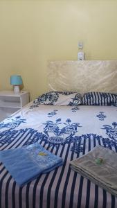 Una cama o camas en una habitación de Villa Morra house III