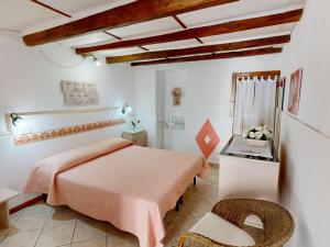 Voodi või voodid majutusasutuse Mareantico Shabby Apartment toas