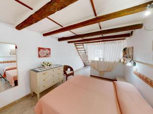 Voodi või voodid majutusasutuse Mareantico Shabby Apartment toas