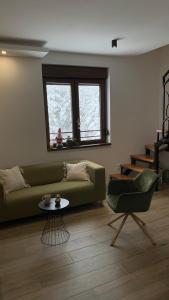 Prostor za sedenje u objektu Apartman Veverko
