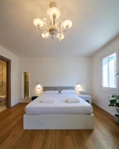 Ένα ή περισσότερα κρεβάτια σε δωμάτιο στο Business e Tourism Superior Rooms con bagno privato MASCHERETTA Venezia Dolo
