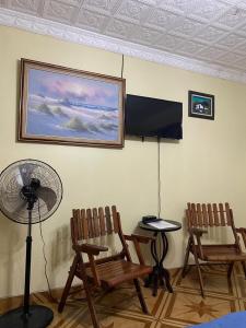 TV a/nebo společenská místnost v ubytování Alexander b&b