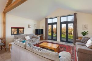 Χώρος καθιστικού στο Leveret Lodge with secure garden for Dogs