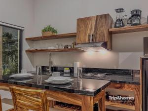 Kuchyň nebo kuchyňský kout v ubytování Hotel Casa Coronel