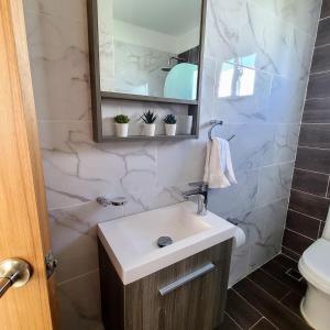 Un baño de Villa in Punta Cana with pool in common area