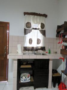 Eldhús eða eldhúskrókur á Artist Room Curaçao