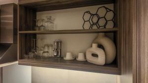 Dapur atau dapur kecil di Modern 1 Bedroom at Foreshore Place Mountain Views & Walk to V&A