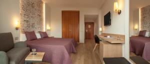 TV a/nebo společenská místnost v ubytování RH Princesa Hotel & Spa 4* Sup