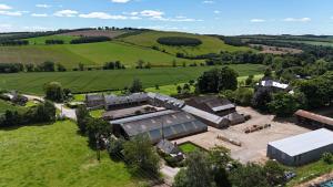 an aerial view of a building in a field at Mrs Moll's Cottage in Earlston