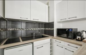 Afbeelding uit fotogalerij van Studio Lumineux et confortable parking in Carrières-sous-Poissy +10 foto's