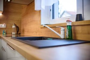 Kuchyňa alebo kuchynka v ubytovaní Apartmány Volavka 2