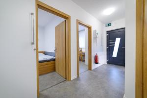 Posteľ alebo postele v izbe v ubytovaní Apartmány Volavka 2