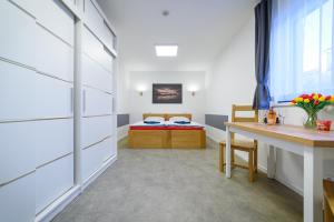 Posteľ alebo postele v izbe v ubytovaní Apartmány Volavka 2