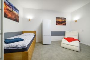Posteľ alebo postele v izbe v ubytovaní Apartmány Volavka 2