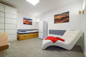 Posteľ alebo postele v izbe v ubytovaní Apartmány Volavka 2