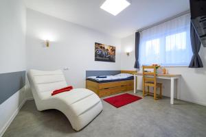 TV a/nebo společenská místnost v ubytování Apartmány Volavka 1