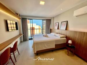 Katil atau katil-katil dalam bilik di Edifício UMI- Intermares +34 gambar