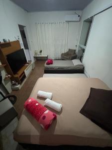 Postel nebo postele na pokoji v ubytování Casa Familiar Da Nise