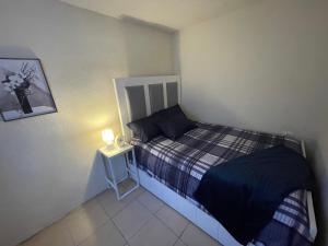 Postel nebo postele na pokoji v ubytování Casa Huésped Amparán