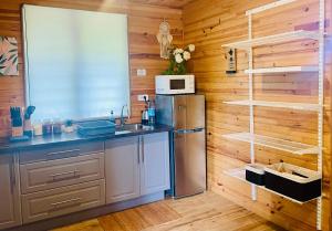 Kuchyň nebo kuchyňský kout v ubytování Rangiroa Beach House