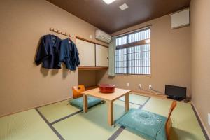 TV a/nebo společenská místnost v ubytování Ryokan Yamazaki