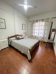 Ένα ή περισσότερα κρεβάτια σε δωμάτιο στο Casa La Peque