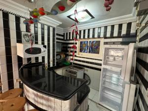 Dapur atau dapur kecil di شقة فندقية بغرفتي نوم فيو بحر كامل اسكندرية +11 gambar