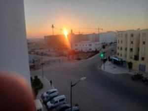 a view of a parking lot with a sunset at luxury apartment in Agadir