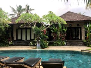 Bazén v ubytování Baliwid Villa Ubud nebo v jeho okolí