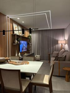 TV a/nebo společenská místnost v ubytování Livin Resort Home