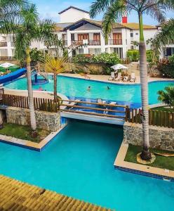 an aerial view of the pool at the resort at TREE BIES RESORT, Apartamento Refúgio dos Sonhos 3 quartos, 2 suítes in Subaúma