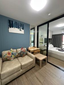 Кровать или кровати в номере ABoutNont HOTEL & MANSION