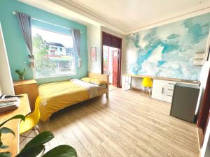 Postel nebo postele na pokoji v ubytování Nấm Home