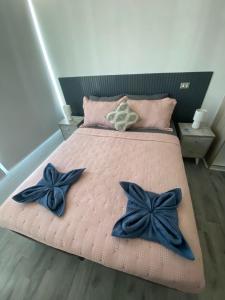 Ένα ή περισσότερα κρεβάτια σε δωμάτιο στο Bello y tranquilo departamento en La Serena