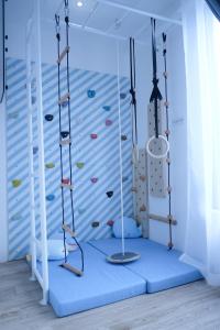 a climbing gym with a climbing wall at Tung Kidcove Centrum Cameron in Brinchang +18 photos