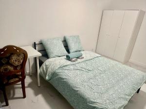 Postel nebo postele na pokoji v ubytování super chambre