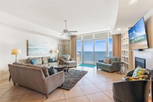 a living room with a view of the ocean at Turquoise Place 2205 C in Orange Beach