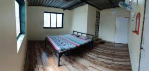 Pranjal Guest House客房内的一张或多张床位