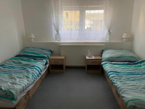 Postel nebo postele na pokoji v ubytování Penzion Dagmar
