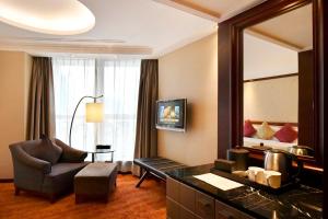 TV a/nebo společenská místnost v ubytování Central Hotel Shanghai - Nanjing Road