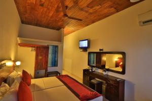 TV a/nebo společenská místnost v ubytování Hotel Lanka Super Corals