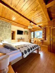 Posteľ alebo postele v izbe v ubytovaní Z Giewontem w Tle Apart&Room