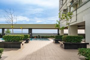 a courtyard with a pool in a building at Premium Apartments in Avida Towers l City Centre l Downtown l Close to Restaurants and Local Shops l by Bleuspace in Davao City