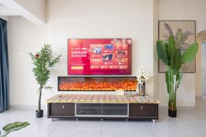 Foto de la galeria de Sanya Zhi Ai Lily Seaview Apartment a Sanya