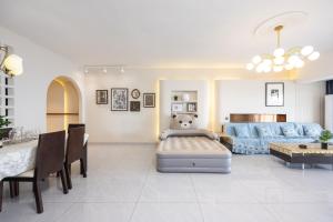 Zona d'estar a Sanya Zhi Ai Lily Seaview Apartment