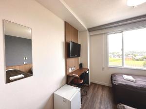 TV a/nebo společenská místnost v ubytování Tabist Tsukuba Sky Hotel