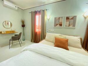 En eller flere senge i et værelse på Onyx