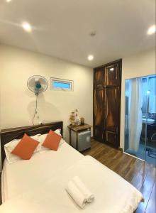 Postel nebo postele na pokoji v ubytování Thủy Tiên-Thạch Thảo