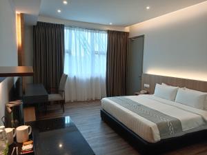 Voodi või voodid majutusasutuse 56 Hotel toas